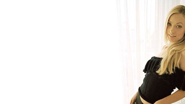 Olivia Wilde Smiling In Black Dress And Golden Hairs Photoshoot